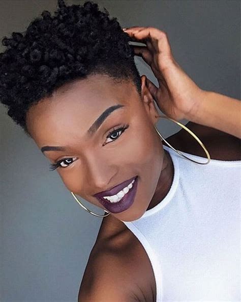 Natural short black hair styles - 2. Salt And Pepper Hair. The main goal of short afro hairstyles for a round face is to provide a slimming effect while enhancing a woman’s beauty. With this minimalistic gray look, you can achieve that …